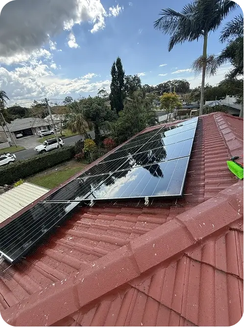Residential rooftop solar panels with completed bird proofing installation on a tiled roof