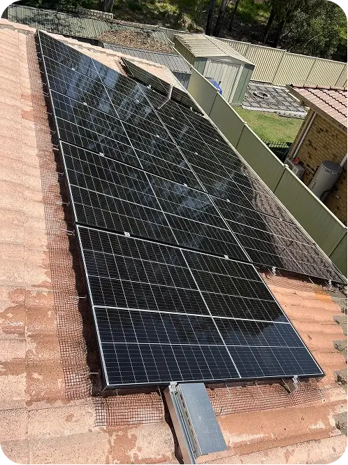 Solar panels fitted with bird proofing mesh around the perimeter to prevent birds nesting underneath